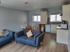O bucătărie sau chicinetă la Cushendall Cottage, Moneyvart +9 fotografii