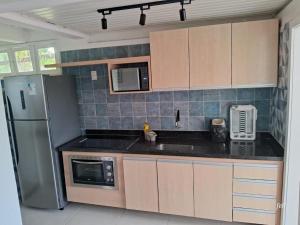 Virtuvė arba virtuvėlė apgyvendinimo įstaigoje Apart Hotel Forte Blu