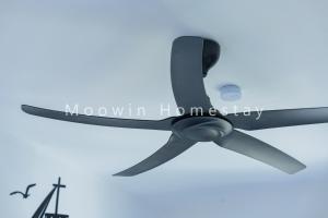 a close up of a black ceiling fan at Comfy Suite by Moowin in Perai