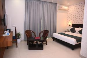 Postel nebo postele na pokoji v ubytování Hotel Zion Inn, Cantonment, Varanasi + 22 fotografií