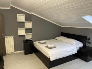 Postel nebo postele na pokoji v ubytování Room Aria
