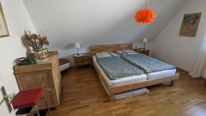 Postel nebo postele na pokoji v ubytování Ferienwohnung Umkirch
