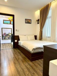 Posteľ alebo postele v izbe v ubytovaní Nguyên Hương Hotel