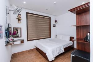 Posteľ alebo postele v izbe v ubytovaní Nguyên Hương Hotel