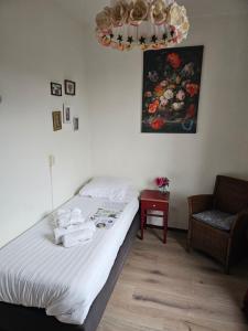 Postel nebo postele na pokoji v ubytování Stee in Stad