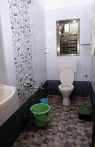 A bathroom at Yash Homestay