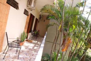 Сад в De la Mora Hostal