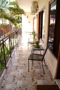 Балкон или терраса в De la Mora Hostal