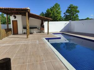 Πισίνα στο ή κοντά στο Ap 8Jardins de Taperapuan