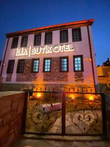 a building with a sign that reads la buffaloord at İLİA BUTİK OTEL in Eceabat
