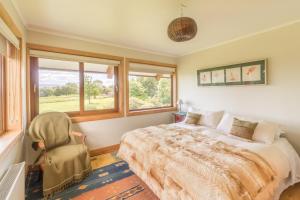 Postel nebo postele na pokoji v ubytování B&B Puerto Varas Playa Venado