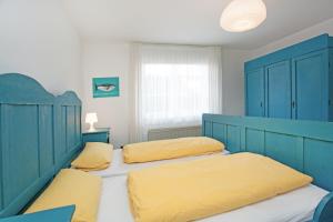 Katil atau katil-katil dalam bilik di Haus Detine - Wohnung 1