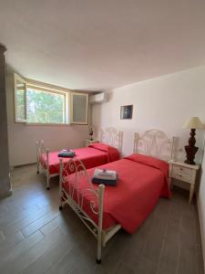 Ένα ή περισσότερα κρεβάτια σε δωμάτιο στο Appartamento Deluxe in Villa Renè +31 φωτογραφίες