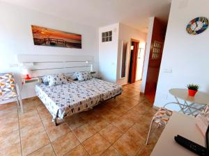 A bed or beds in a room at Agata Views