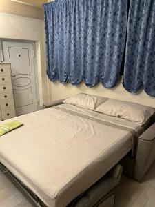 Postel nebo postele na pokoji v ubytování Civico 12 - casa vacanze
