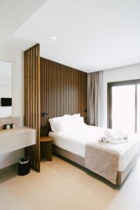 Łóżko lub łóżka w pokoju w obiekcie LAN-GO SIVOTA Luxury Living