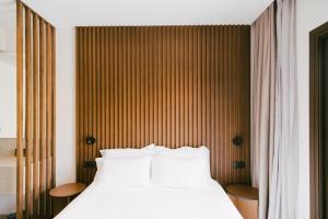 Łóżko lub łóżka w pokoju w obiekcie LAN-GO SIVOTA Luxury Living