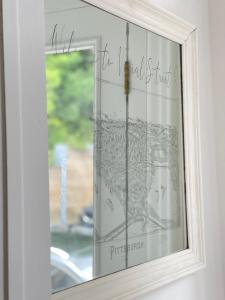 a picture of a window with the words the end first at Central Pittsburgh 5-Bed Haven in Pittsburgh
