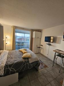 Posteľ alebo postele v izbe v ubytovaní Studio Sanary-sur-Mer proche gare
