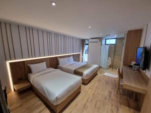 TV a/nebo společenská místnost v ubytování Nirundorn Resort Chaam