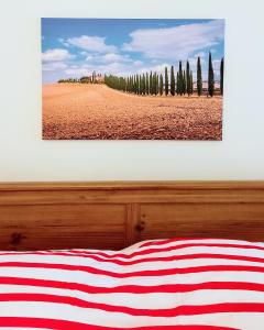 a picture of an american flag laying on a bed at RossoToscano 