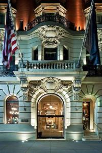 a building with two flags on top of it at Hotel-Studio @ The Mansfield Midtown in New York