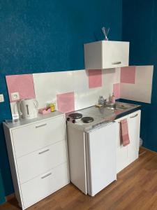 Kjøkken eller kjøkkenkrok på The Pink Blue