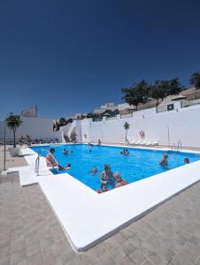 Πισίνα στο ή κοντά στο Casita de la luz with seasonal swimmingpool