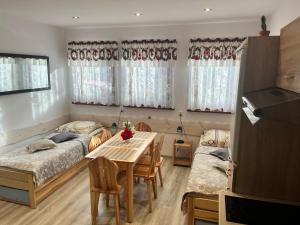 Posteľ alebo postele v izbe v ubytovaní Apartamenty u Grażyny