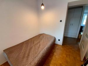 Postel nebo postele na pokoji v ubytování Tymi2 nice apartment in the center of city + 5 fotografií