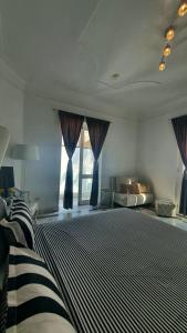 Postel nebo postele na pokoji v ubytování Riad VIP Bed & Breakfast