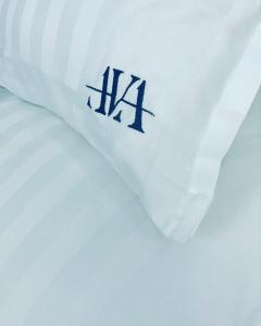 a white shirt with the word ak on it at AVA PROPERTY RENTALS in Făgăraş