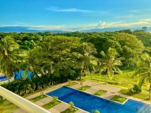 an aerial view of a resort with a swimming pool at PlayaBlanca Ocean Blue "Vista al Mar" in Playa Blanca