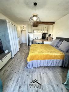 Postel nebo postele na pokoji v ubytování Studio Bloom - Papeete