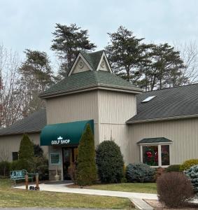 a building with a gift shop in front of it at Cozy 4BR Ski retreat and Water Park! in Massanutten