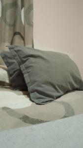 En eller flere senge i et værelse på LA RAÍZ- CASA DE ALQUILER DE VACACIONES