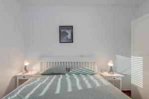 Postel nebo postele na pokoji v ubytování B&B Paradiso - Pakleni Islands Hvar