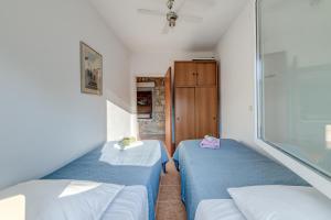 Postel nebo postele na pokoji v ubytování B&B Paradiso - Pakleni Islands Hvar