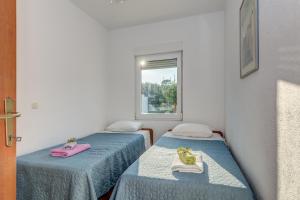 Postel nebo postele na pokoji v ubytování B&B Paradiso - Pakleni Islands Hvar