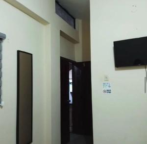 TV a/nebo společenská místnost v ubytování Veranera Hostal
