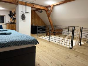 Postel nebo postele na pokoji v ubytování Apartmány Kanteho grunt