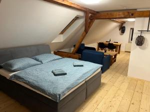 Postel nebo postele na pokoji v ubytování Apartmány Kanteho grunt