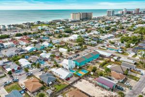 an aerial view of a city with the ocean at Sand Castle in Panama City Beach