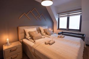Letto o letti in una camera di Glečer Kop, Apartment A14, FREE Parking Garage