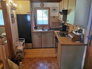 Kuchyň nebo kuchyňský kout v ubytování Chalet Dixence