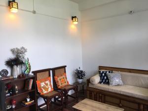 Postel nebo postele na pokoji v ubytování Mohija Homestay