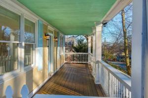 a front porch of a house with a porch at Amazing Location Spacious House in Atlanta