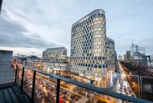 a view of a city with a tall building at Apartment with Stunning View in City Center in Brussels