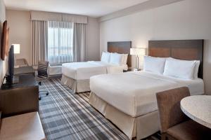 Postel nebo postele na pokoji v ubytování Fairfield Inn & Suites by Marriott Airdrie