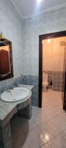 a bathroom with a sink and a toilet at perle du tanger in Tangier